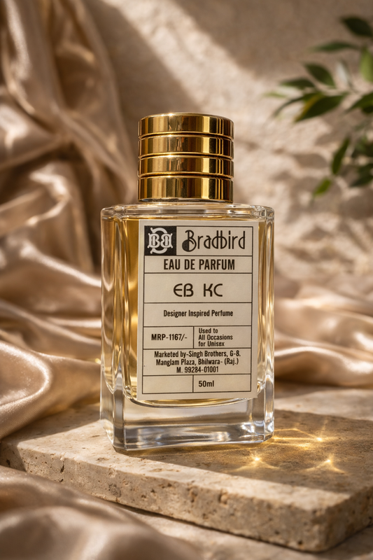 EB KC eau de parfum bottle with gold cap; clear glass, 50ml label visible