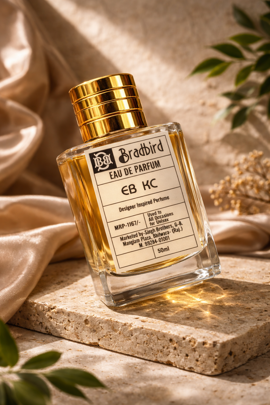 Front label on EB KC eau de parfum bottle with gold cap; 50ml volume shown