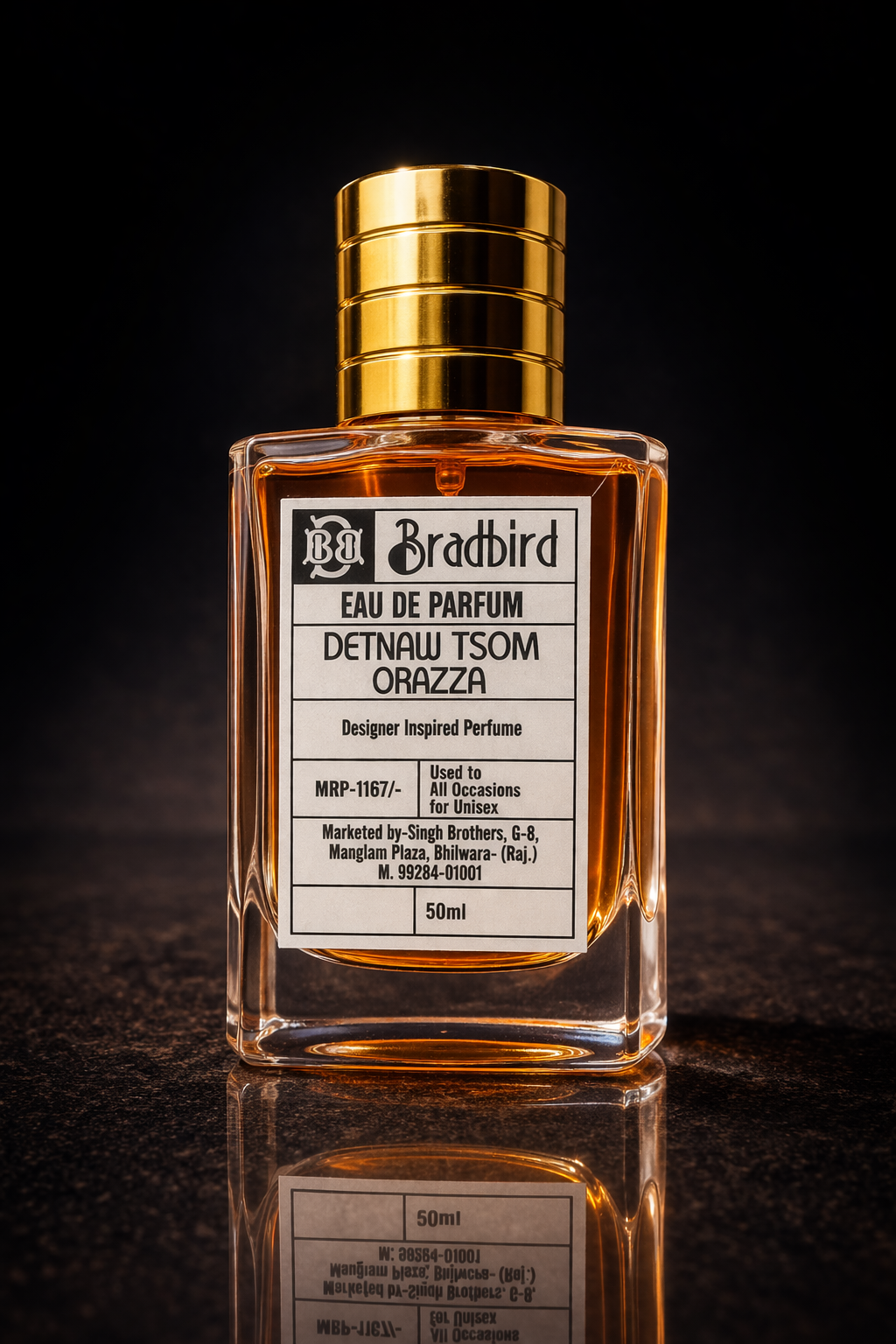 Eau de Parfum bottle with amber glass, gold ribbed cap, and front label