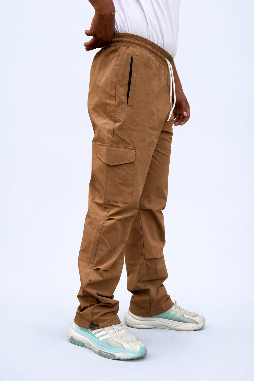 Brown cargo joggers, back view with cargo pockets and drawstring ankle ties