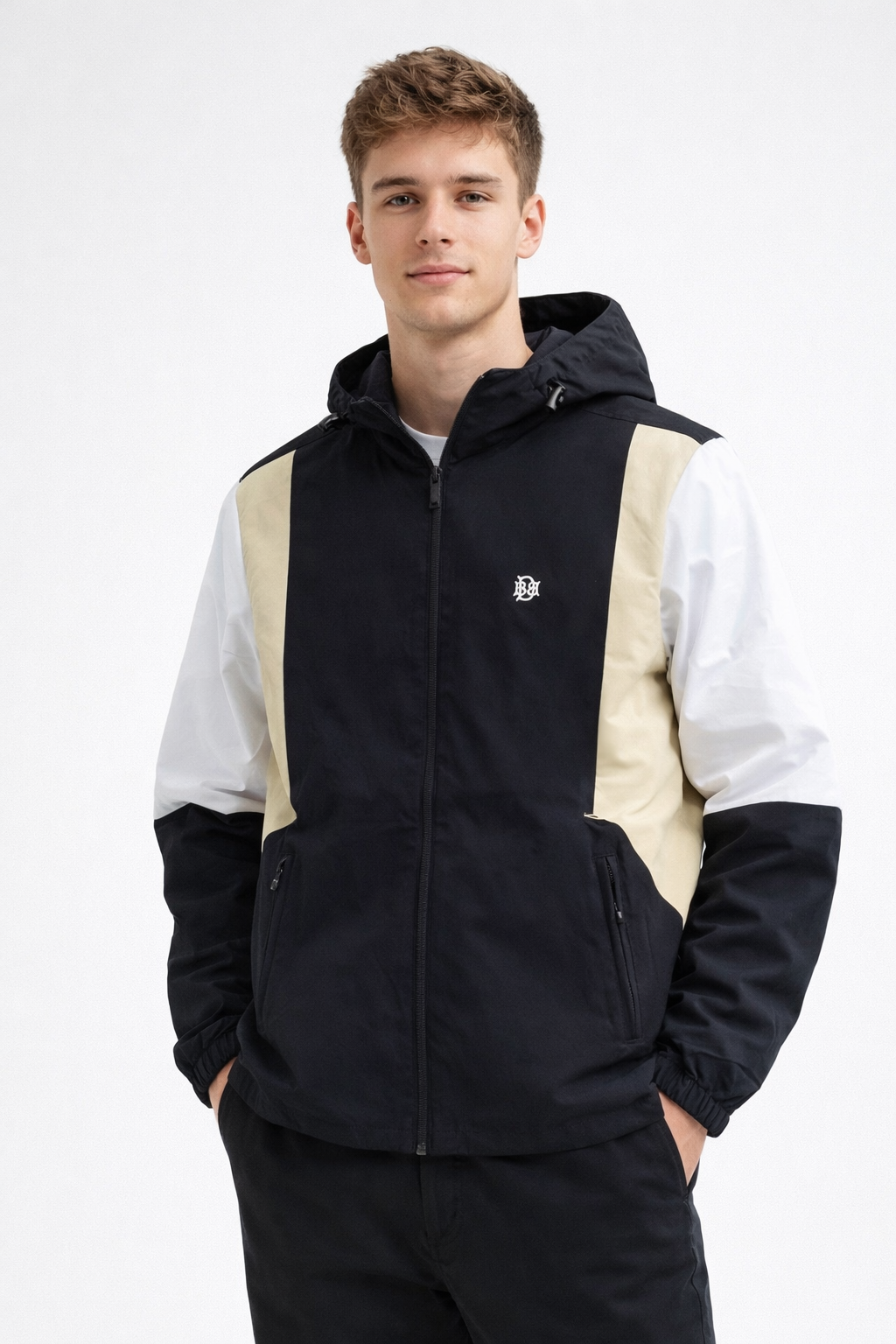 Black hooded windbreaker with sand and white paneling, zip-front and chest logo