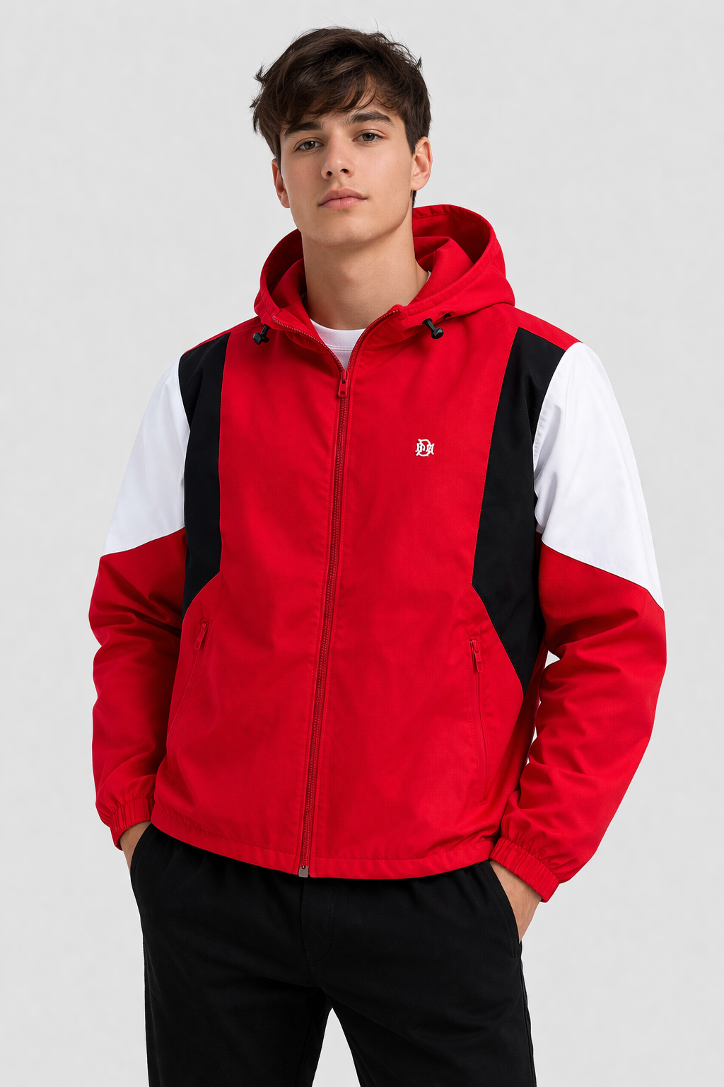 Scarlet red hooded windbreaker with black and white panels, front view