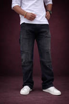 Men's charcoal grey cargo denim jeans with carpenter-style patch pockets, straight fit