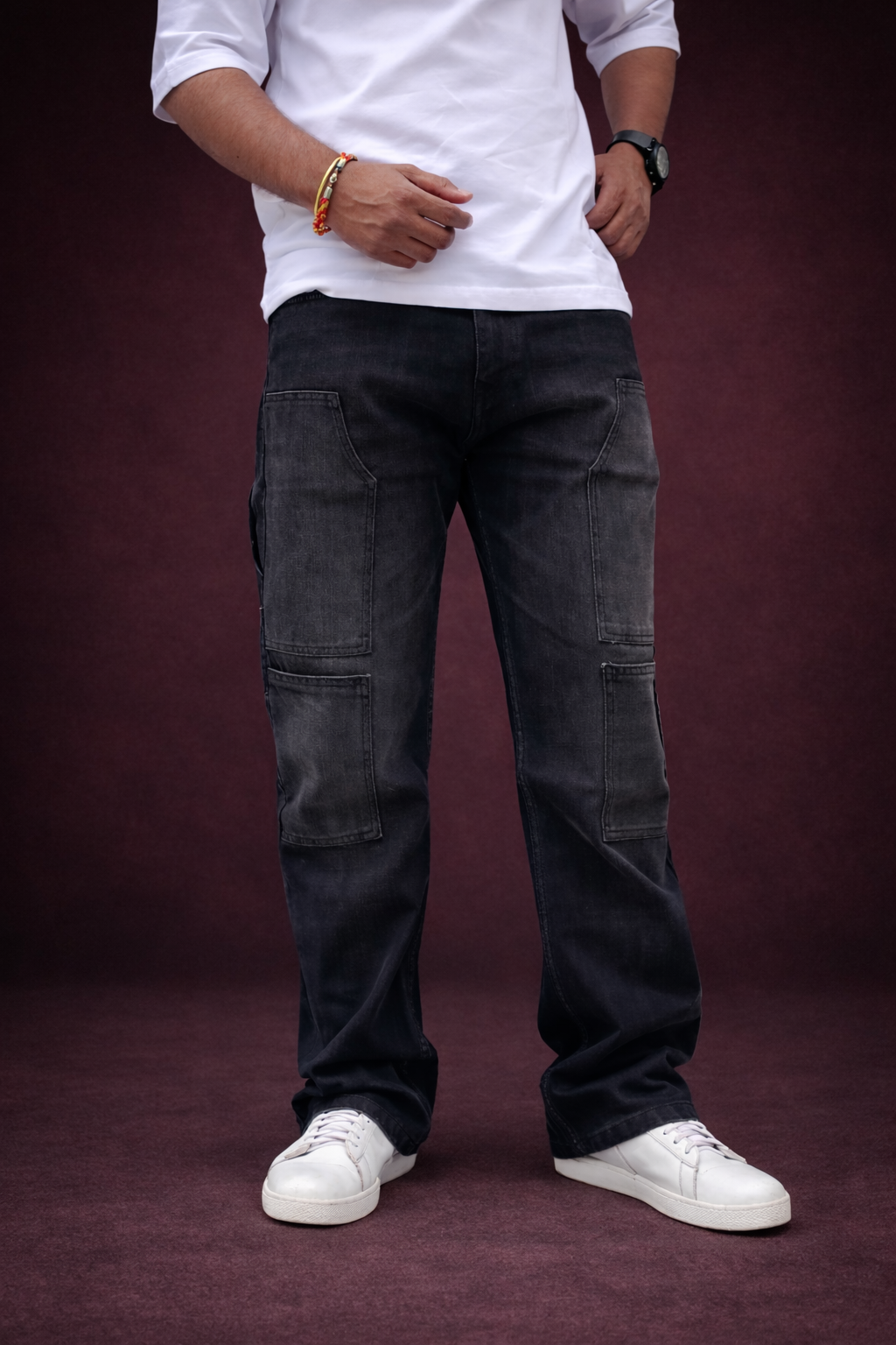 Men's charcoal grey cargo denim jeans with carpenter-style patch pockets, straight fit