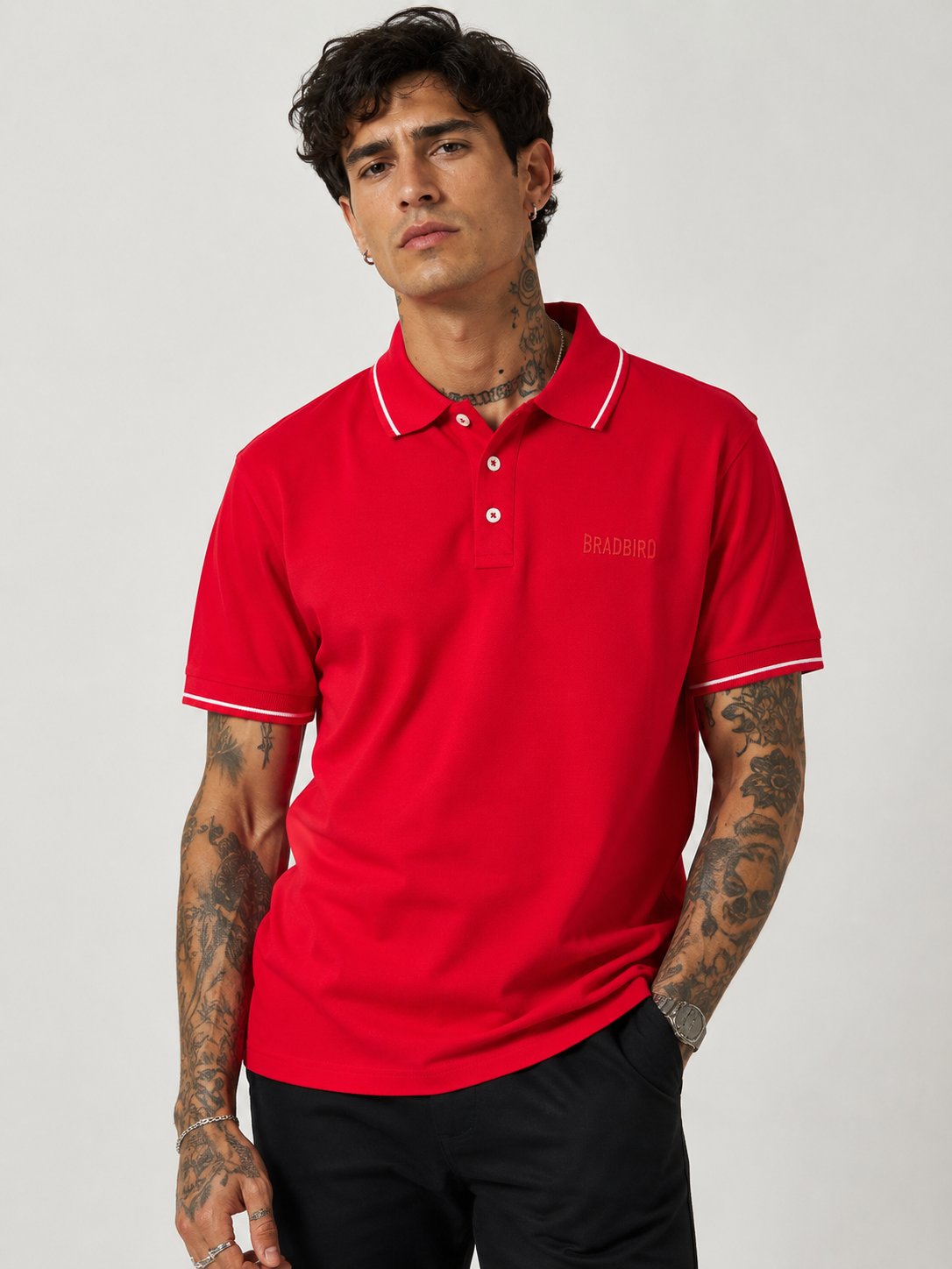 Red polo shirt with two-button placket, contrast collar and sleeve cuffs, Bradbird logo