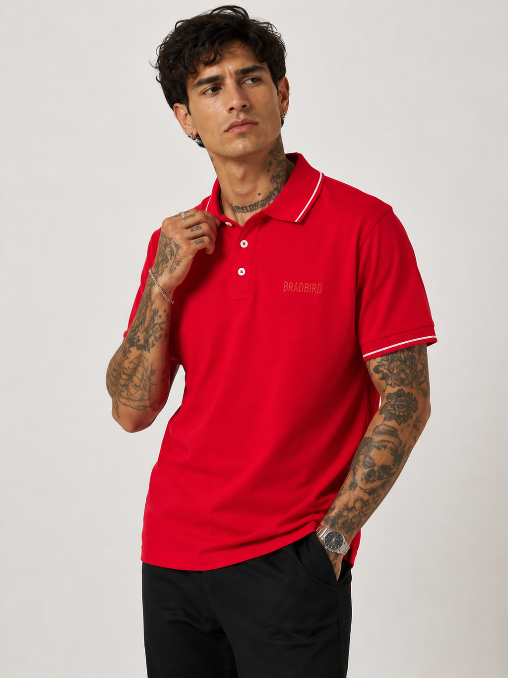 Red polo shirt with contrast collar trim and sleeve tipping, button front, Bradbird logo