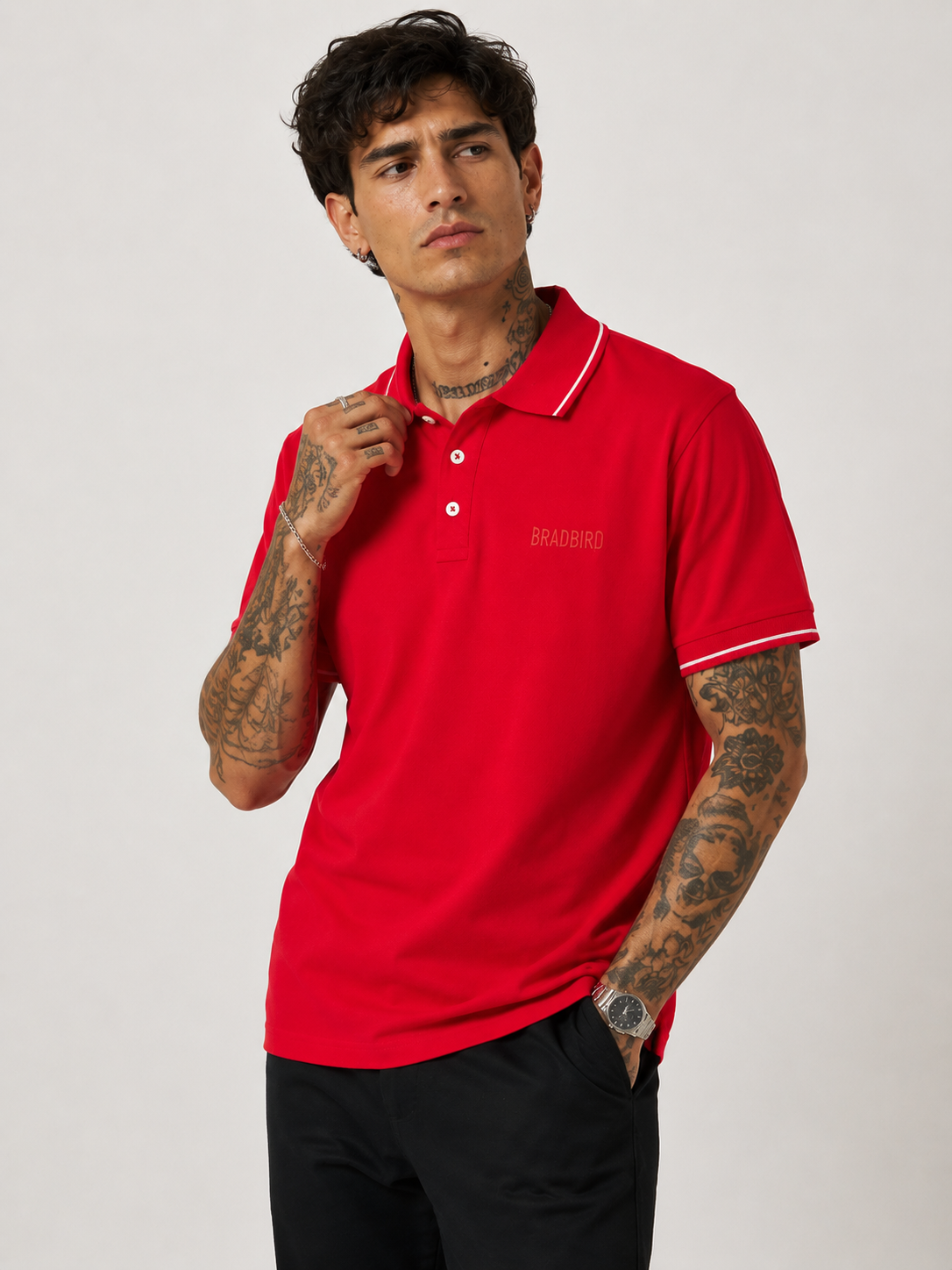 Red polo shirt with contrast collar trim and sleeve tipping, button front, Bradbird logo