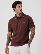 Coffee brown polo shirt with white contrast trim and Bradbird logo on chest.
