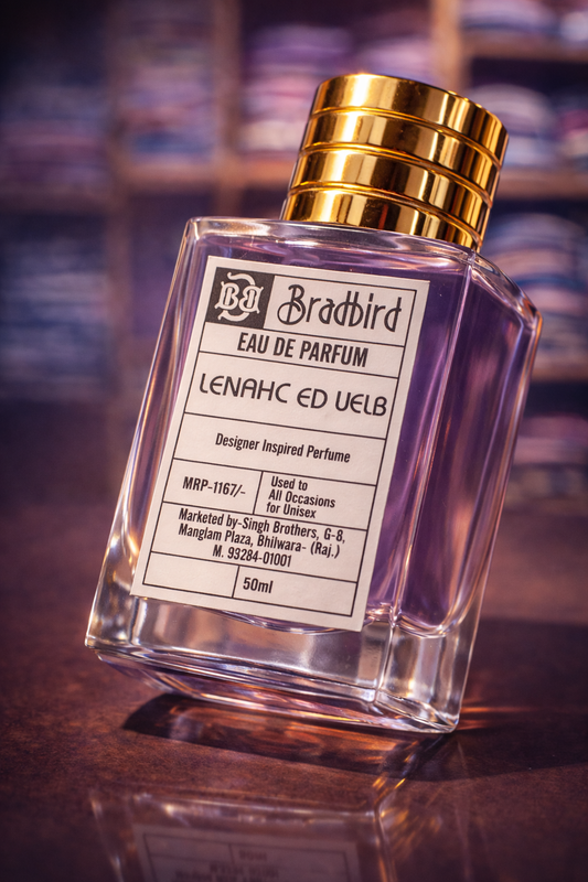 Bradbird Eau de Parfum bottle angled view, gold cap, clear glass, 50ml