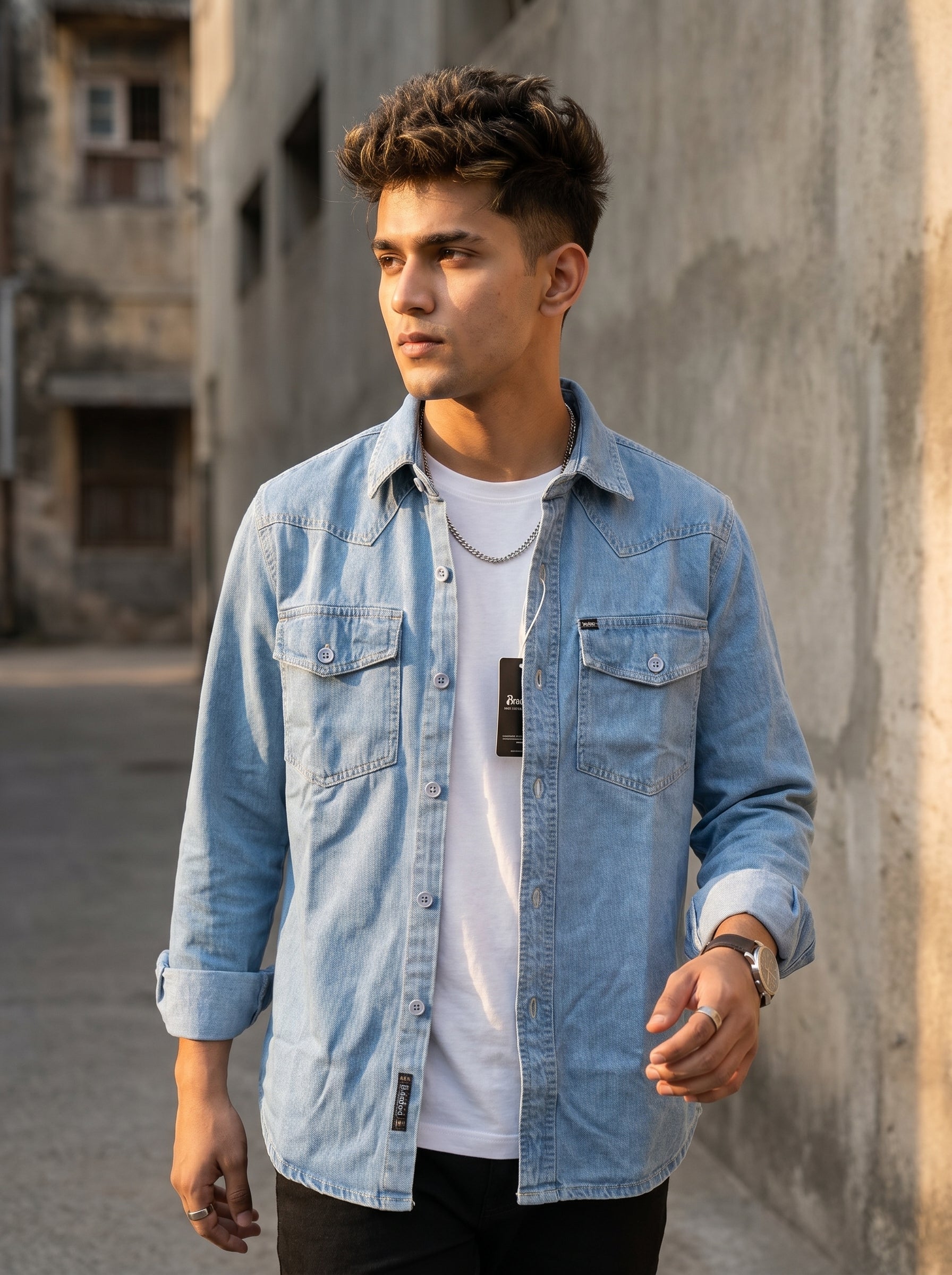Light blue denim shirt with button front and two chest pockets