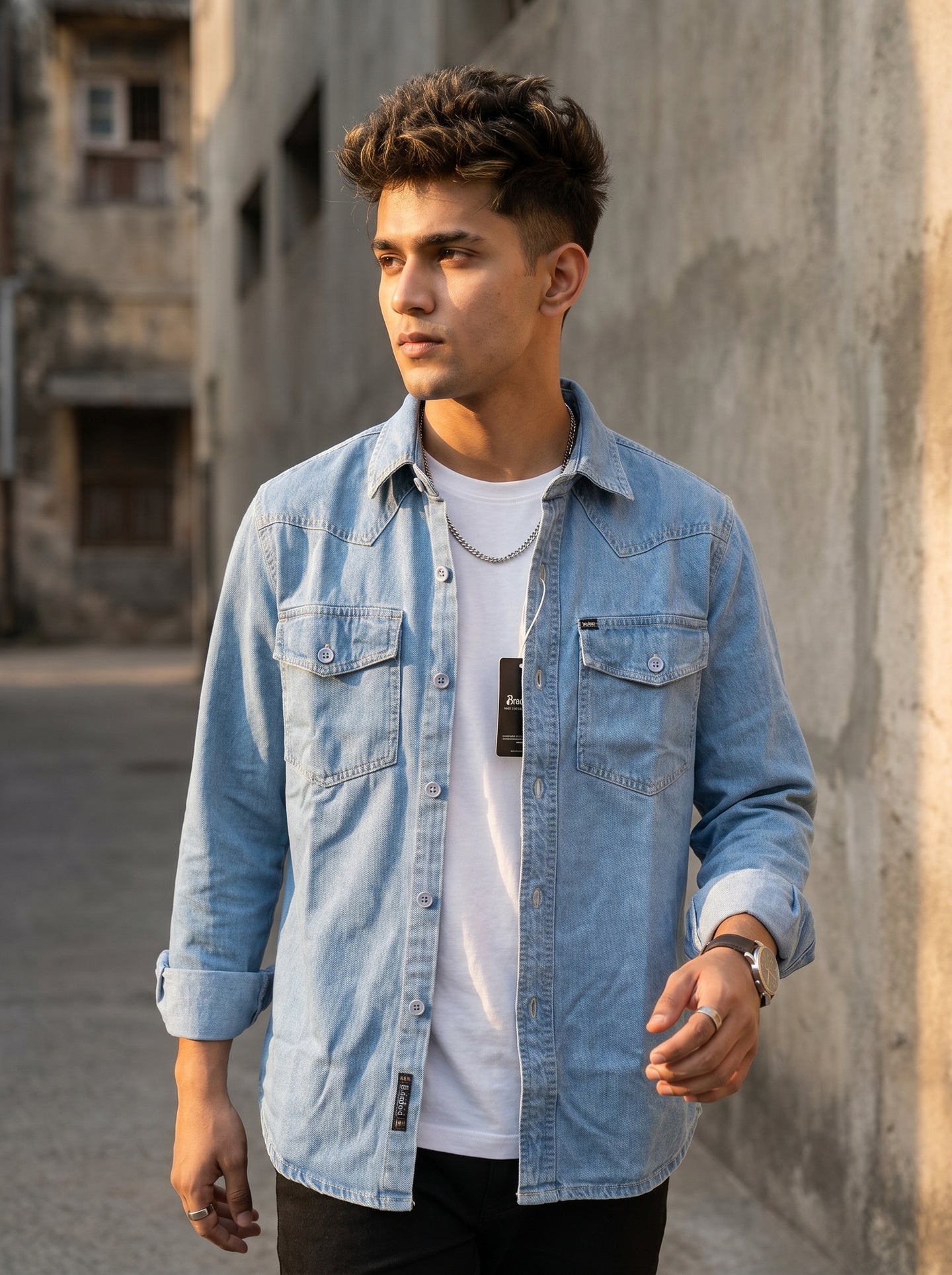 Light blue denim shirt with button front and two chest pockets