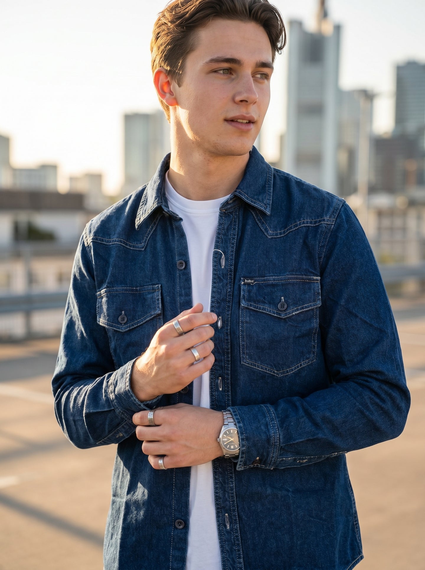 Blue denim western-style shirt with notch collar and button-down front