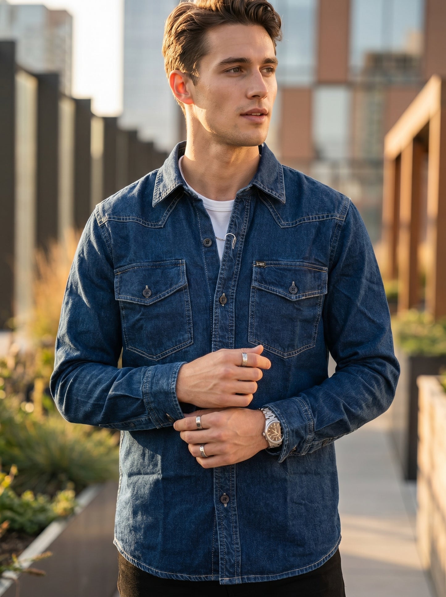 Blue denim western-style shirt with collar and flap chest pockets, button front
