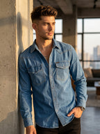 Medium wash denim western shirt with button front and two flap chest pockets