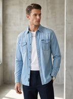 Light wash denim over-shirt with snap buttons and two flap chest pockets