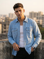Light wash denim western over-shirt with snap-front placket and two chest pockets