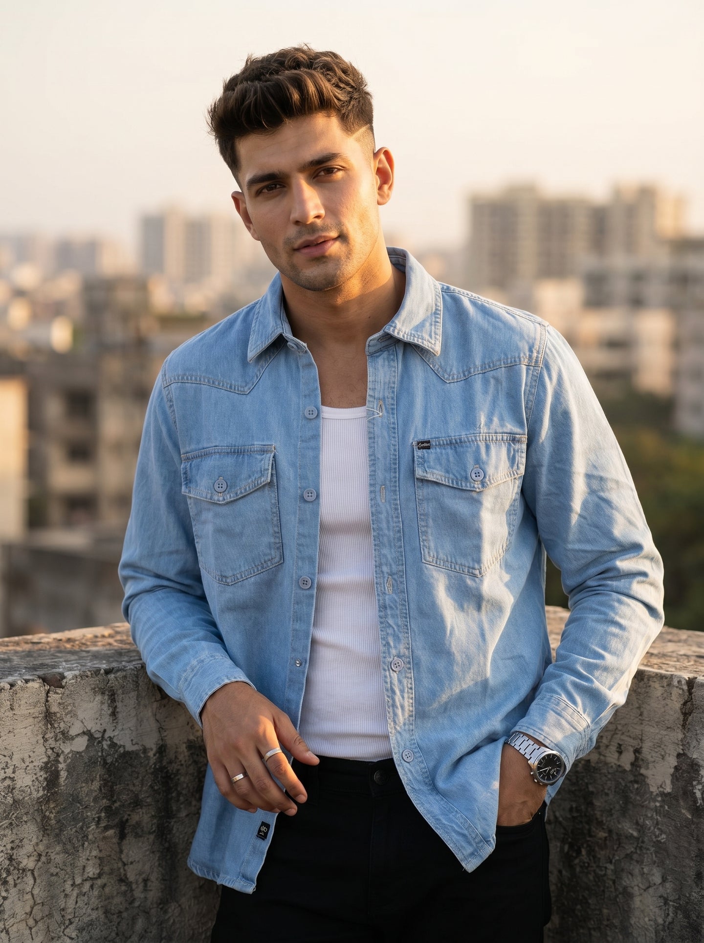 Light wash denim western over-shirt with snap-front placket and two chest pockets