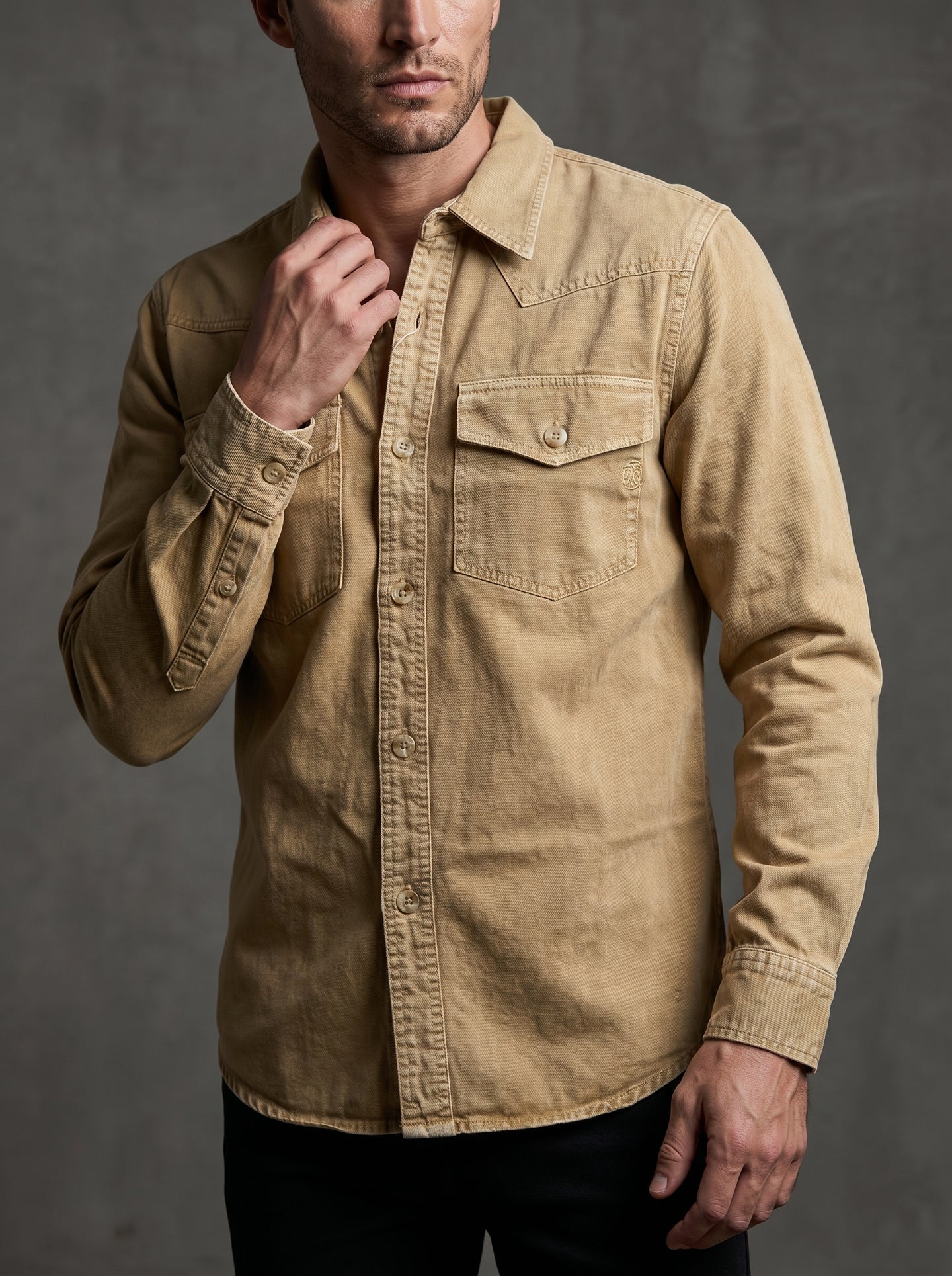 Tan beige denim western shirt with pointed collar, button front, and flap chest pocket