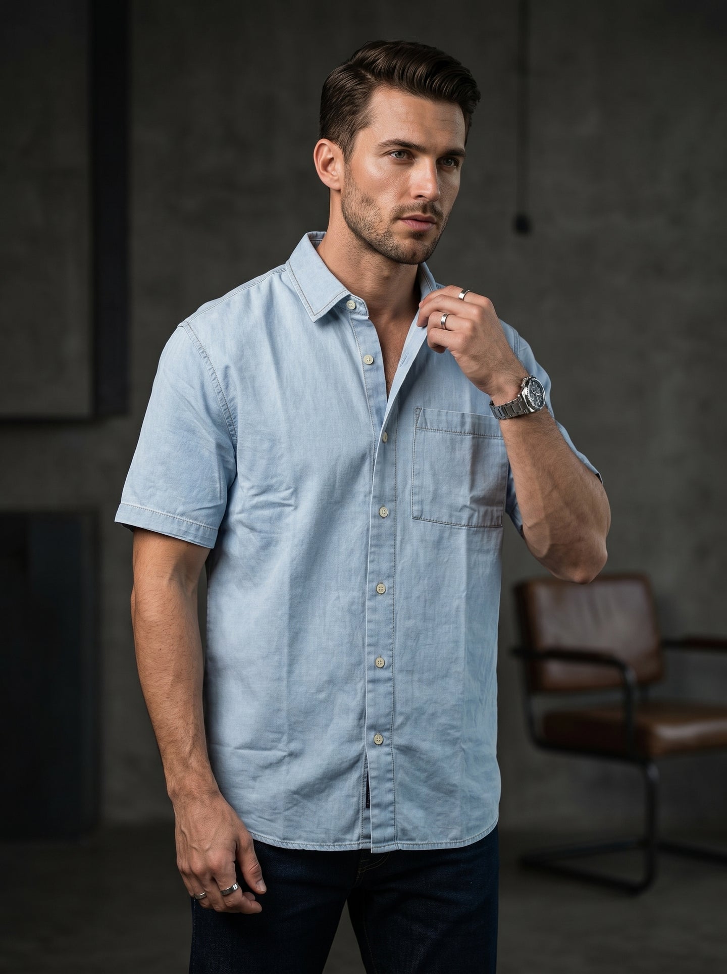 Powder blue denim half-sleeve shirt on model, button front and chest pocket