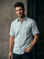 Mint light-wash denim half-sleeve button-up shirt, front view with chest pocket
