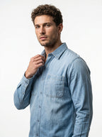 Men's light-wash denim long-sleeve shirt with chest pockets and single-button cuffs