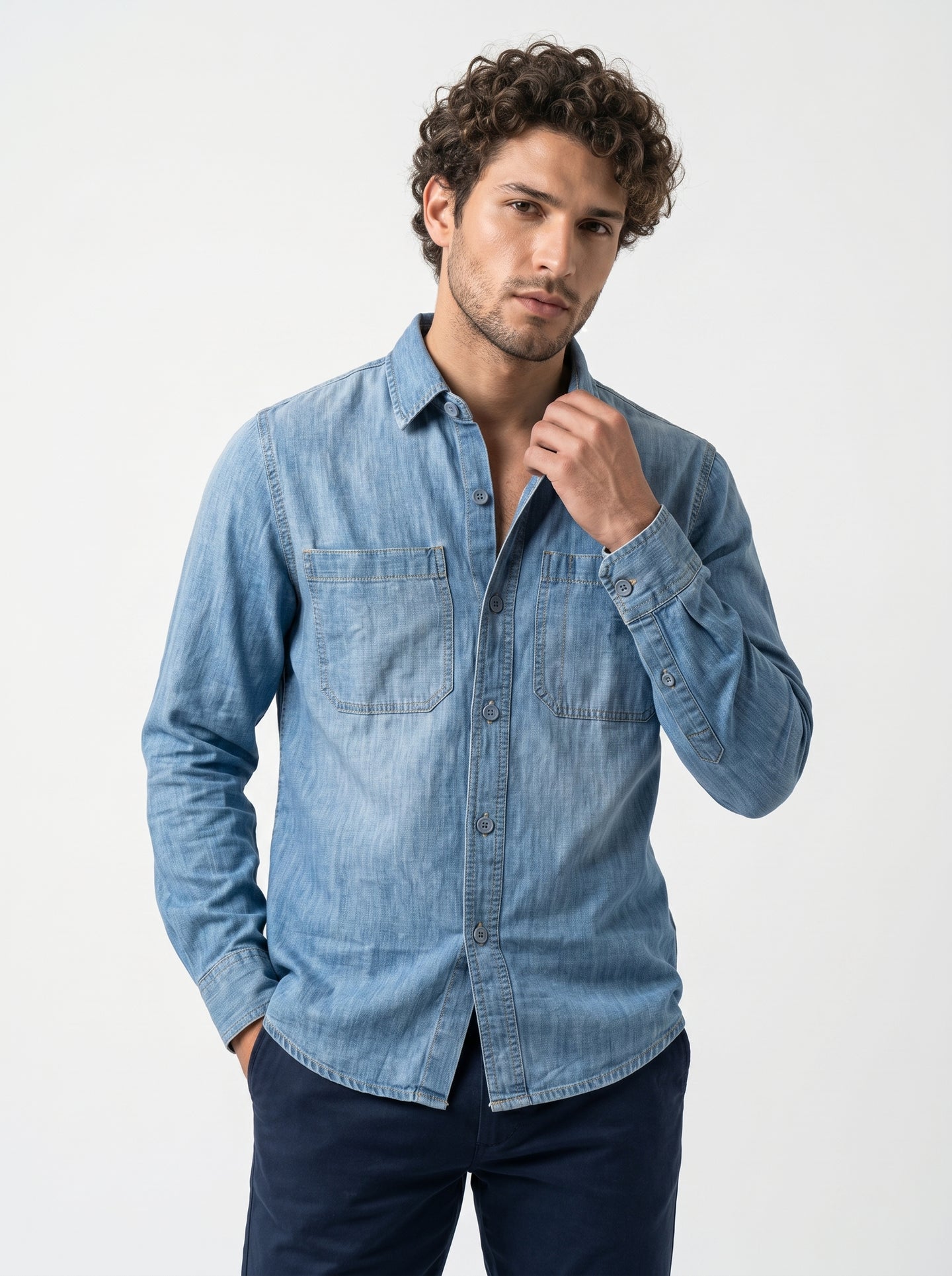 Men's light-wash denim long-sleeve shirt with two chest pockets and button front