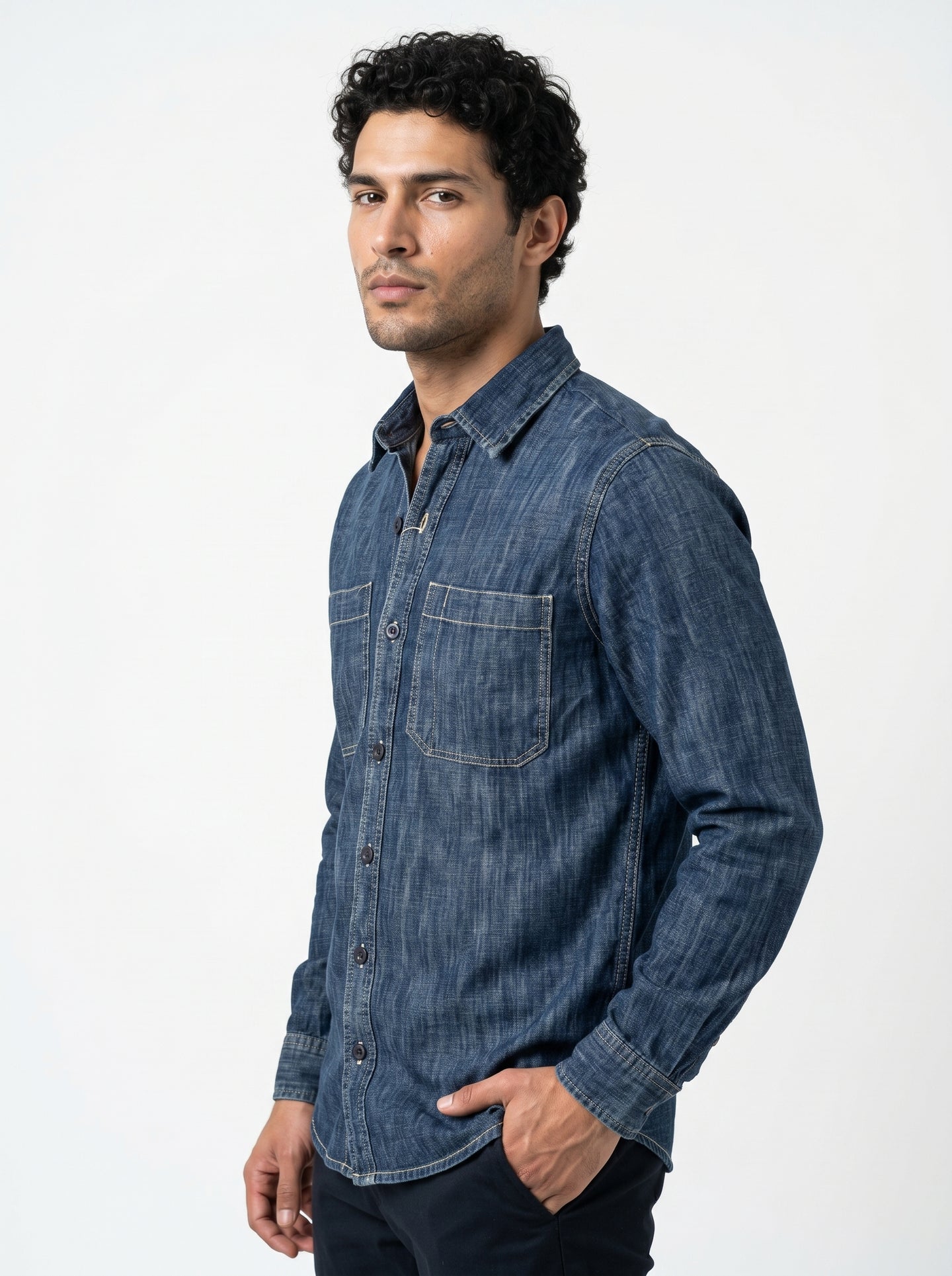 Stonewash indigo long-sleeve denim shirt with two chest pockets and button front