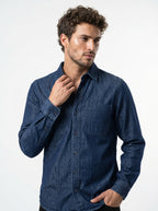 Indigo stonewash long-sleeve denim shirt with two chest pockets and button front
