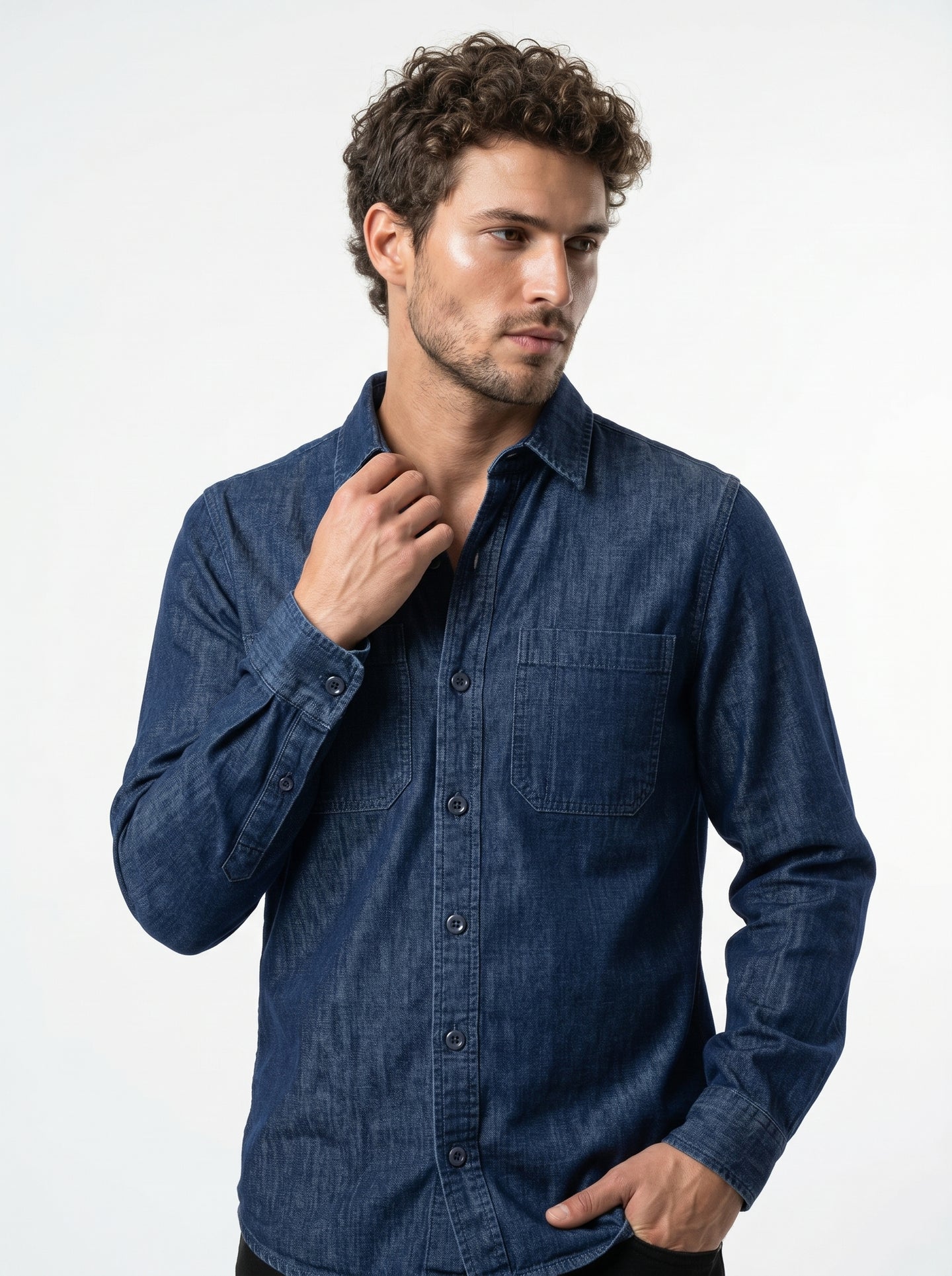 Indigo stonewash long-sleeve denim shirt with two chest pockets and button front