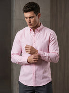 Light pink textured oxford shirt, button-up front with small tonal monogram detail