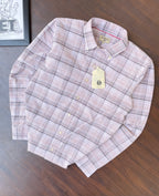Pink and dark windowpane check oxford shirt laid flat, button-up collar and cuffs