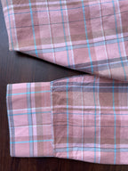 Pink plaid oxford shirt cuff and sleeve seam detail