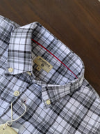Black-and-white plaid shirt collar with inner tag and neckline stitching