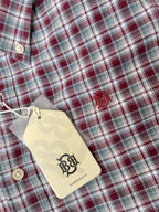 Red, green, and white plaid oxford shirt chest detail with embroidered logo