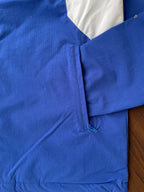 Blue windbreaker front zipper and stand collar with white panel trim