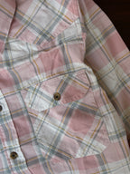 Dusty pink plaid western shirt chest pockets with buttoned flap detail