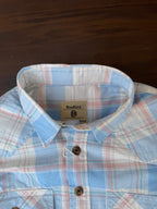Sky blue plaid shirt collar and button placket, interior tag visible