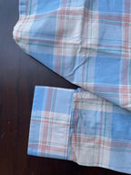 Sky blue plaid shirt cuff and sleeve hem with stitched edge