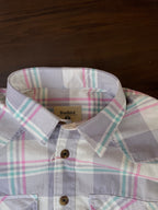Placket and collar view of lavender and grey plaid western shirt, buttoned