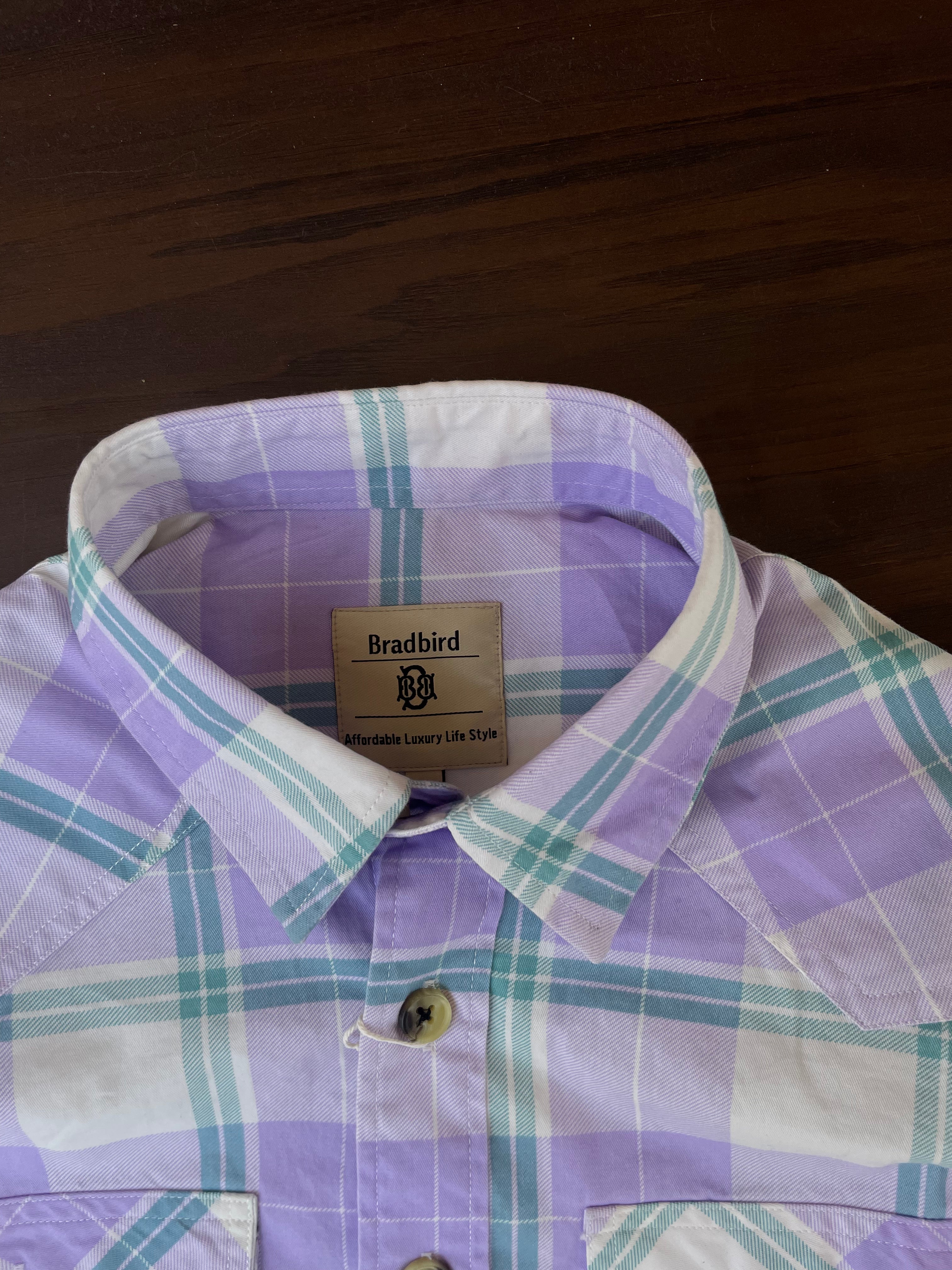 Purple and teal plaid western shirt collar with button placket and interior label