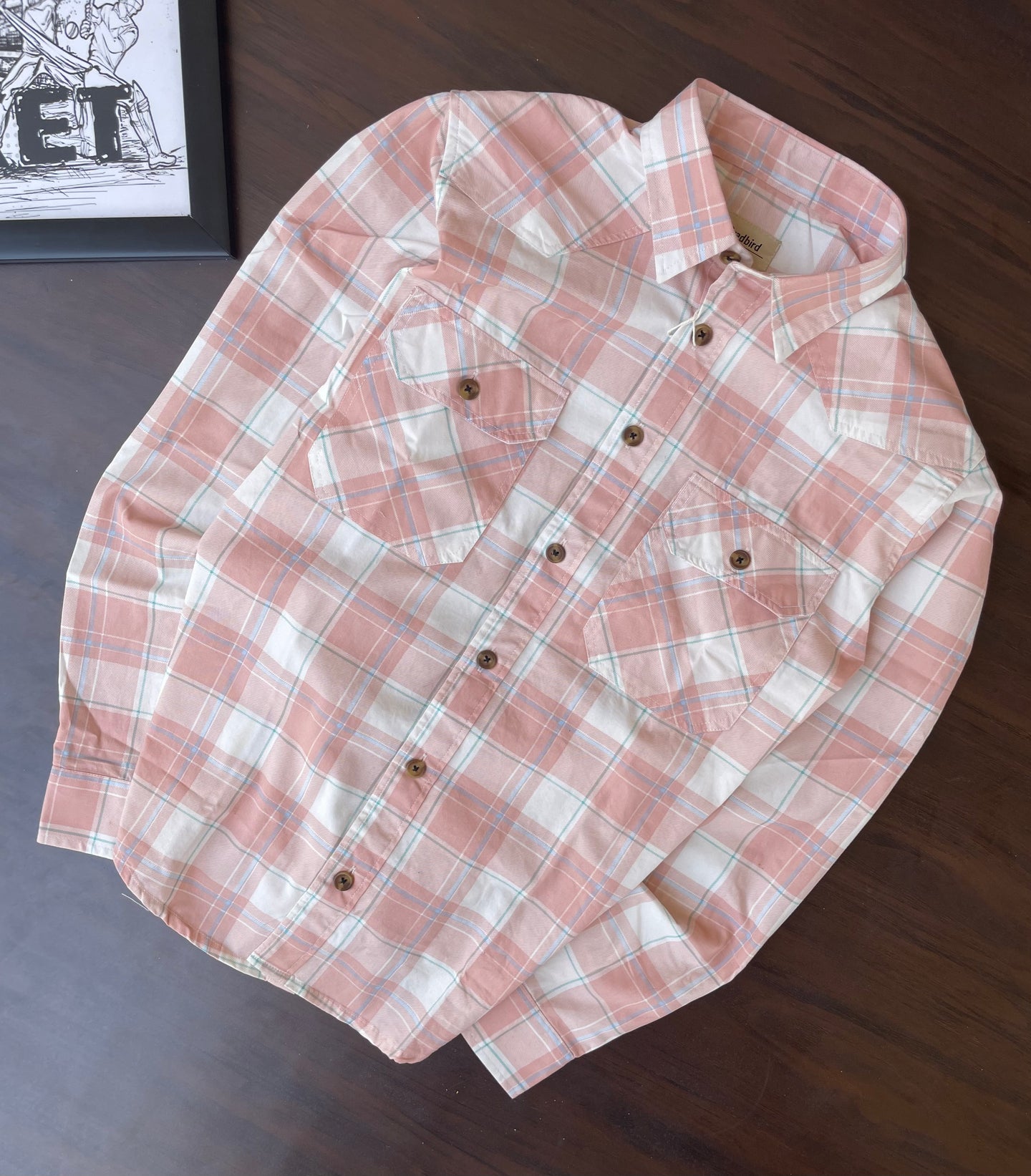 Peach and white plaid button-up western shirt, flat lay showing double chest pockets