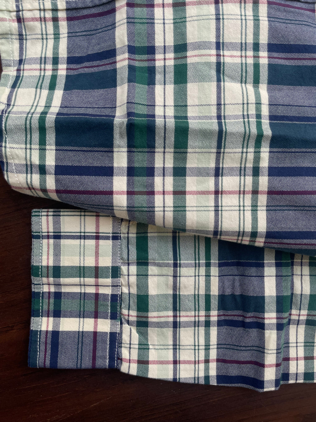 Green and navy plaid cotton shirt, folded cuff and hem detail