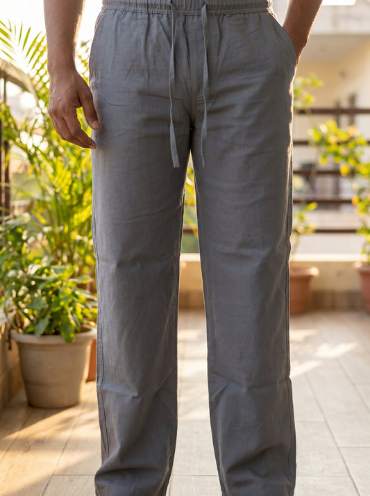 Light grey relaxed drawstring pants, back view, elastic waistband and straight legs