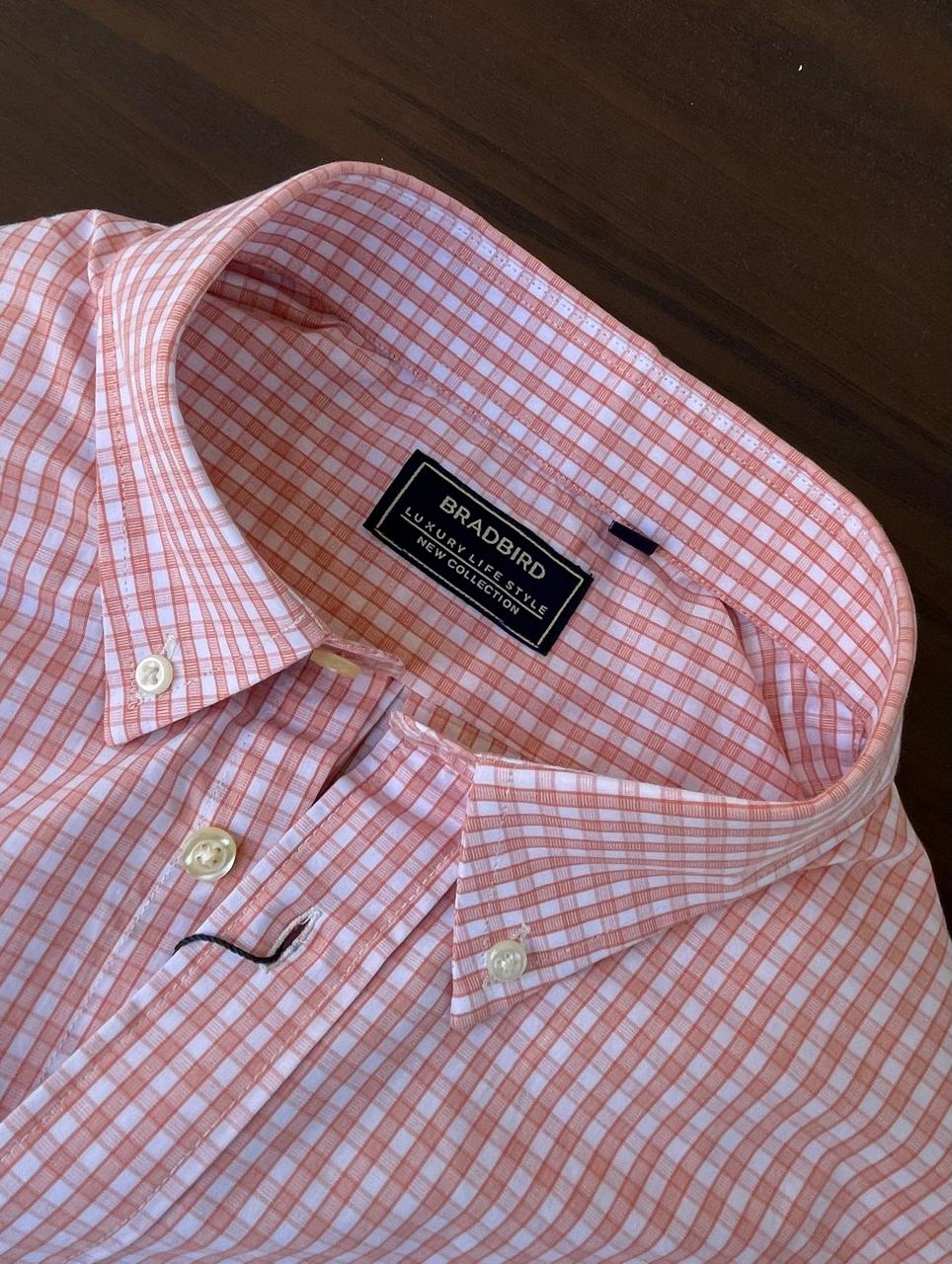 Peach gingham shirt interior neck label, buttoned placket and collar