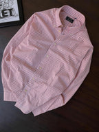 Peach gingham check dress shirt with button front and point collar, laid flat