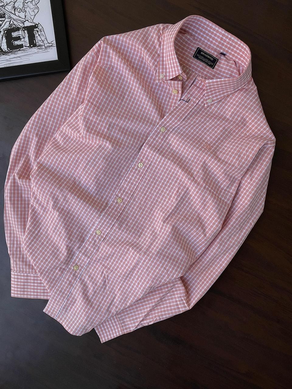 Peach gingham check dress shirt with button front and point collar, laid flat