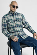 Green and navy plaid cotton shirt with two chest pockets, button-up front