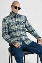 Green and navy plaid cotton shirt with two chest pockets, button-up front