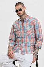 Bold check casual shirt in red, blue, and green; button front and two chest pockets