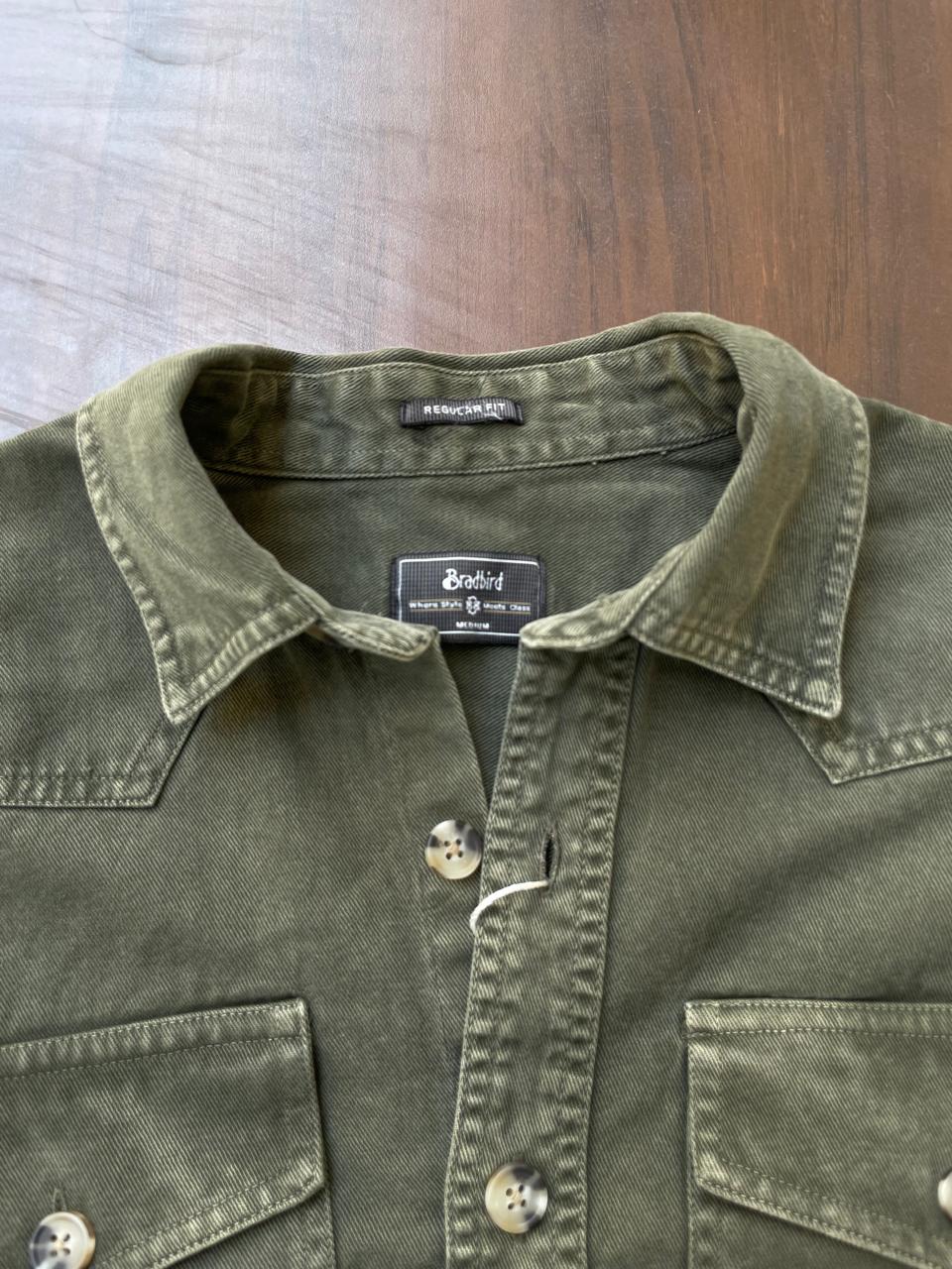 Olive denim shirt collar with button placket and chest pocket detail